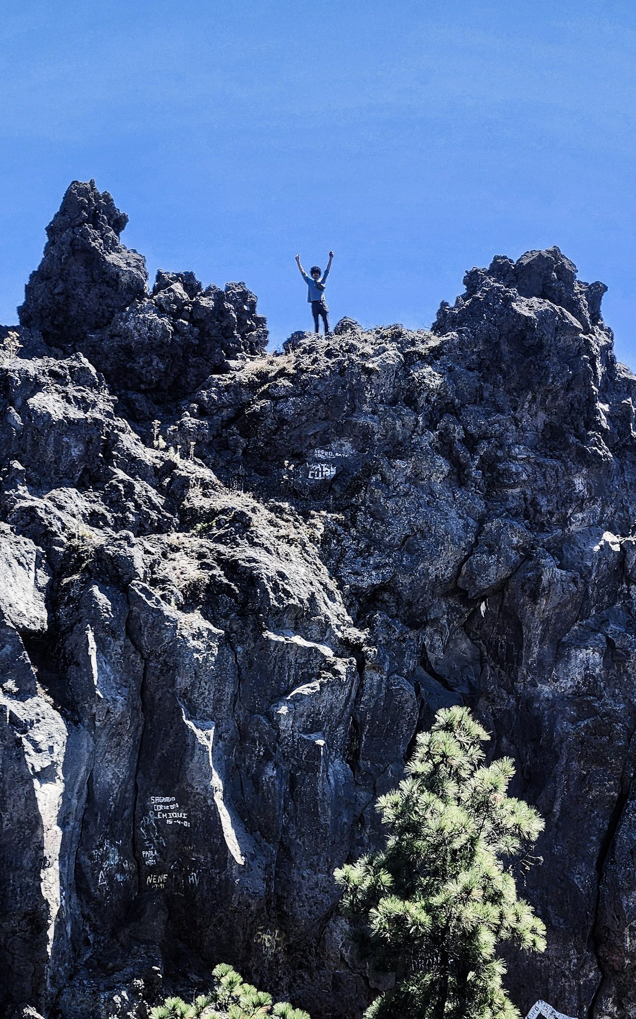 A client standing on top of La Muela on Cerro Quemado.